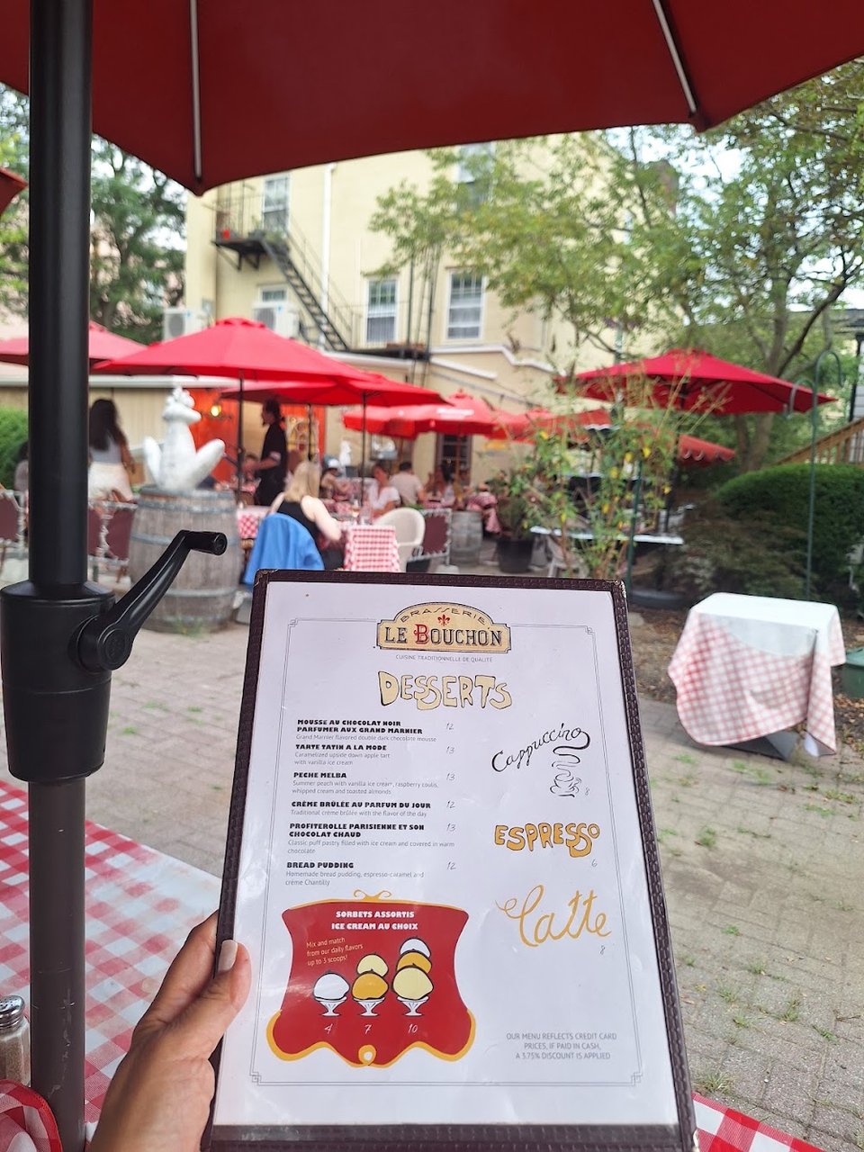 Menu page featuring bistro dishes and red wine.