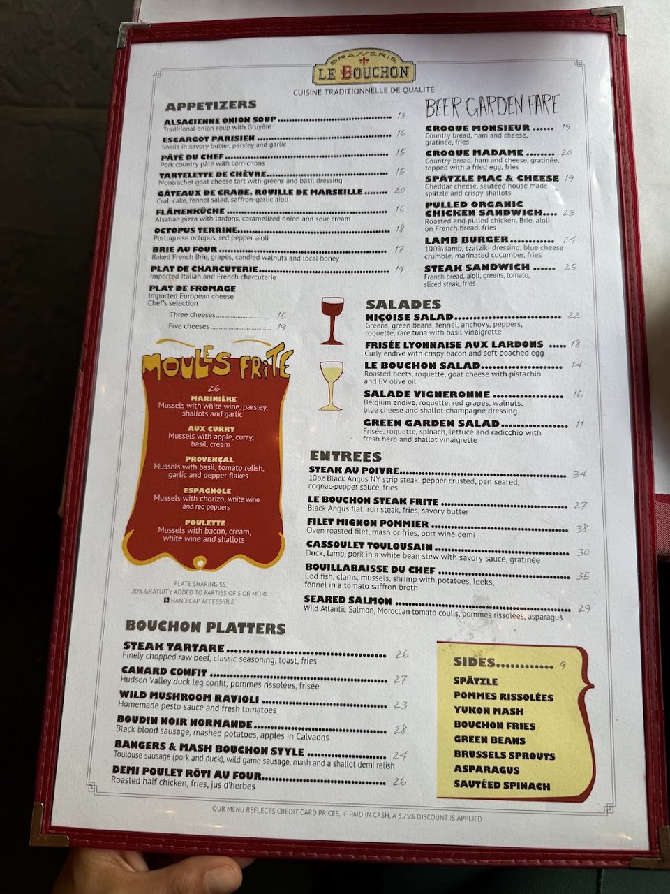 French restaurant menu with salads and entrees.